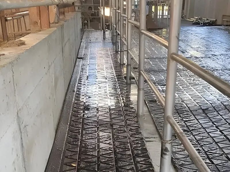 Custom-cut long roll flooring in a calf shed
